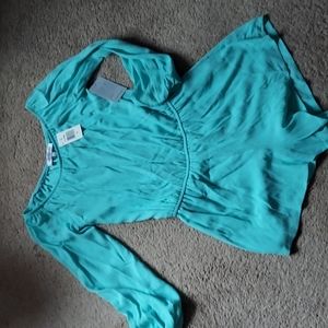 NWT sea foam green fully lined romper size M